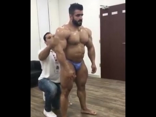 gaystorage smeared with arab oil. gay erotic porn bodybuilder jock muscular guy guy athlete steroids petting legs